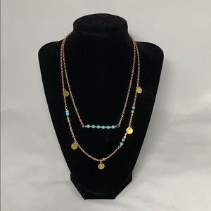 Layered gold and turquoise toned necklace
